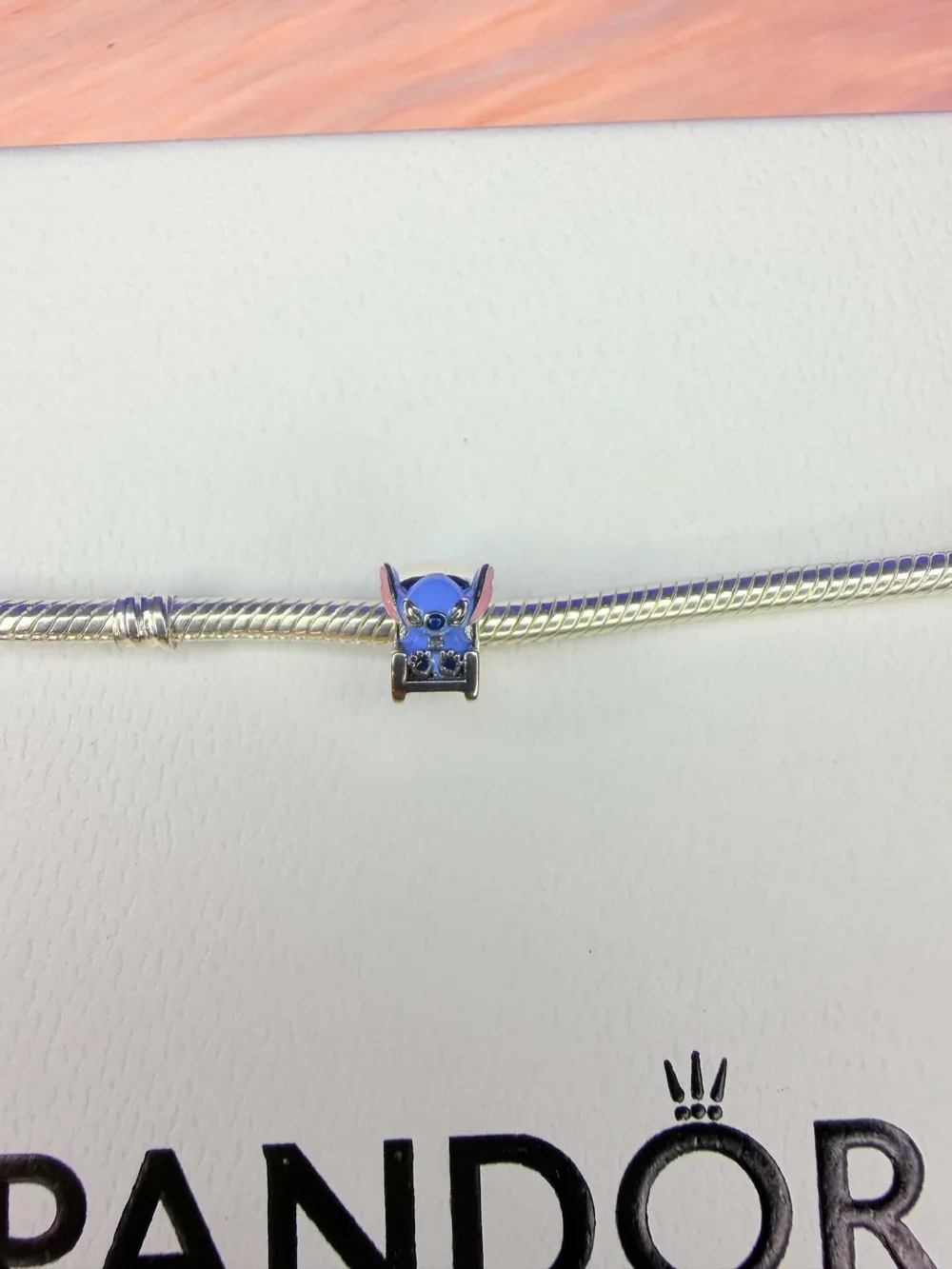 Pandora Blue Stitch Charm on Silver Snake Bracelet